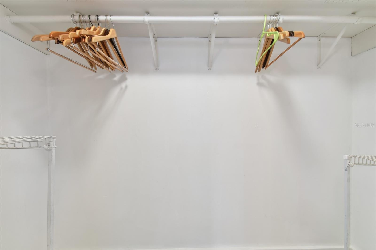 Closet in primary bedroom and primary bath both