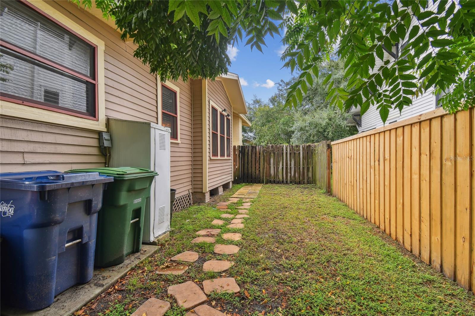 Access to back yard from driveway gate