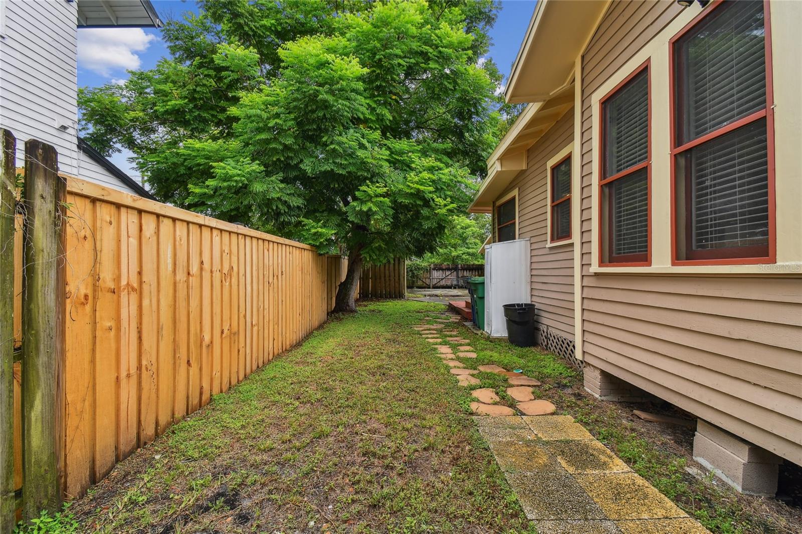 Access to back yard from driveway gate