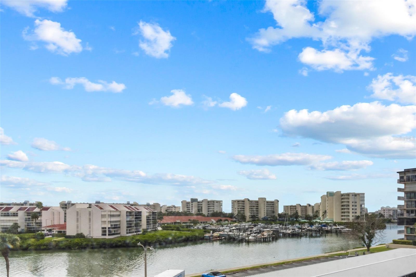 ENJOY THE WATER VIEWS FROM YOUR SNACK BAR, LIVING ROOM & BEDROOMS.