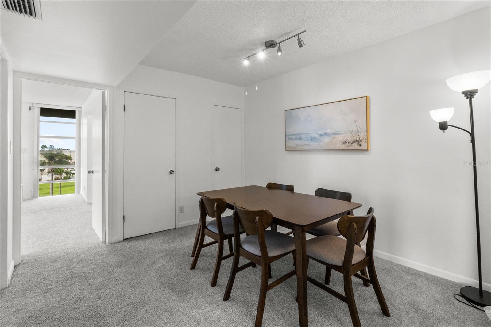 THE DINING ROOM IS SEPARATE AND ONLY STEPS AWAY FROM THE KITCHEN.