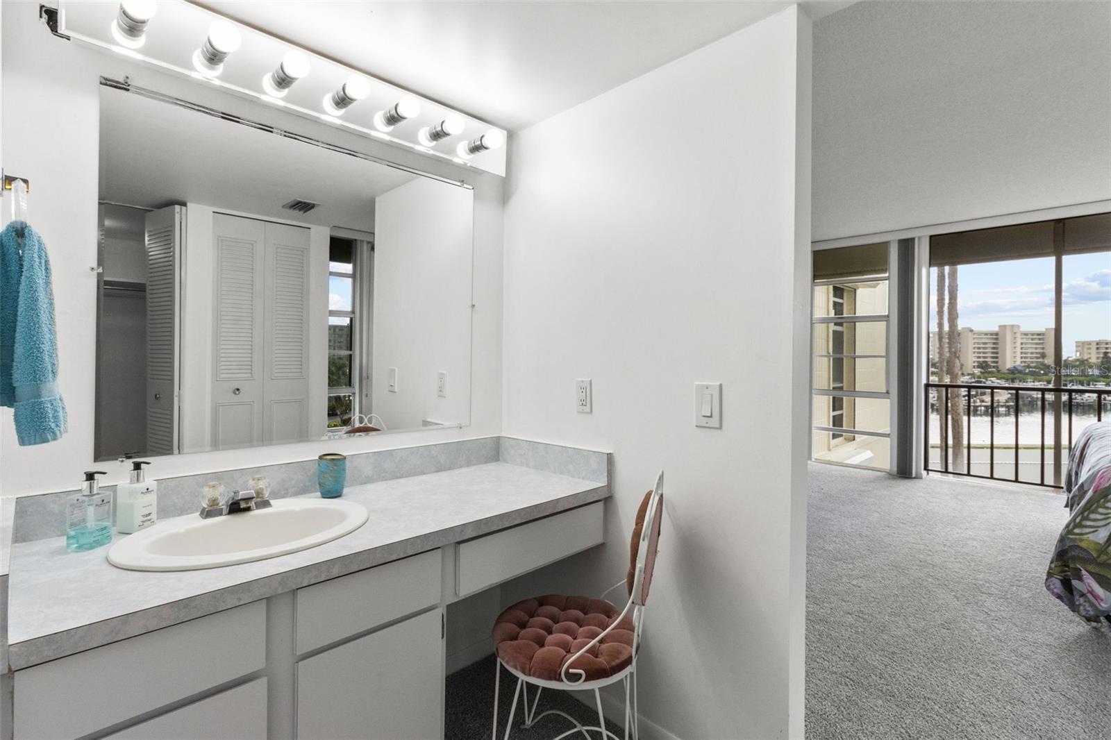 THE PRIMARY BEDROOM ALSO FEATURES AN ENSUITE BATHROOM.  WITH A LARGE VANITY AREA, WALK IN CLOSET AND LINEN CLOSET.