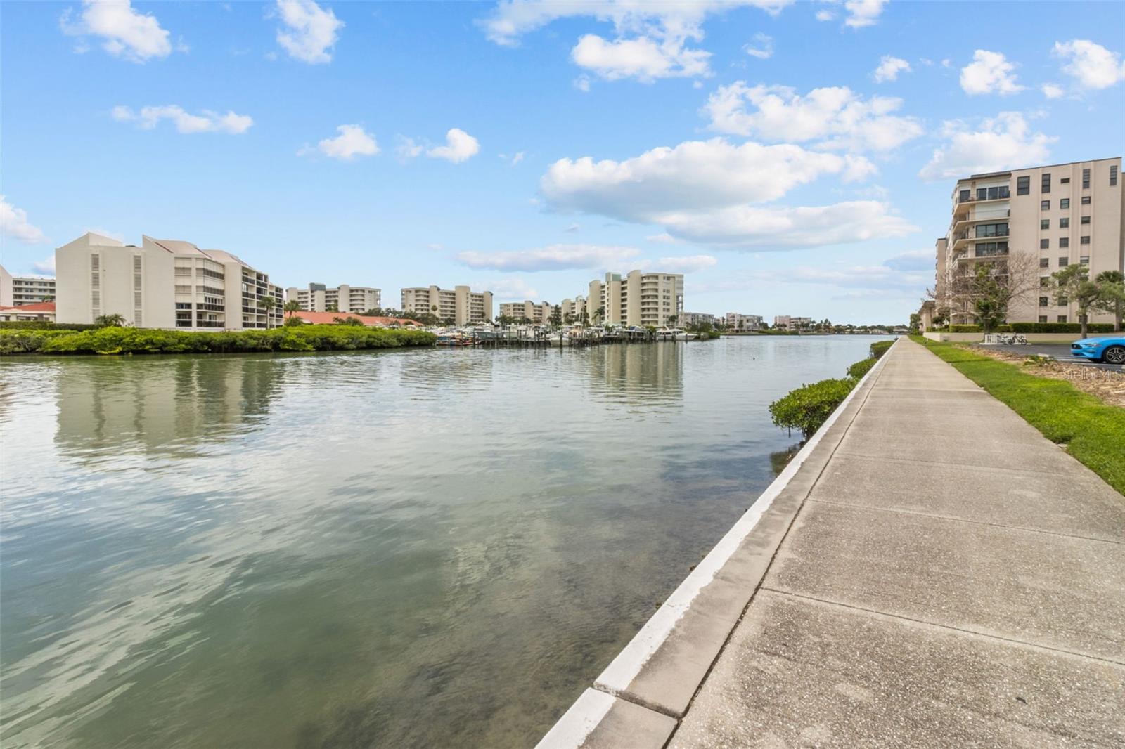 ONLY STEPS AWAY FROM #412, THE BAY ISLAND GATED & WATERFRONT COMMUNITY FEATURES A SCENIC WALKING TRAIL ALONG THE WATERS EDGE.