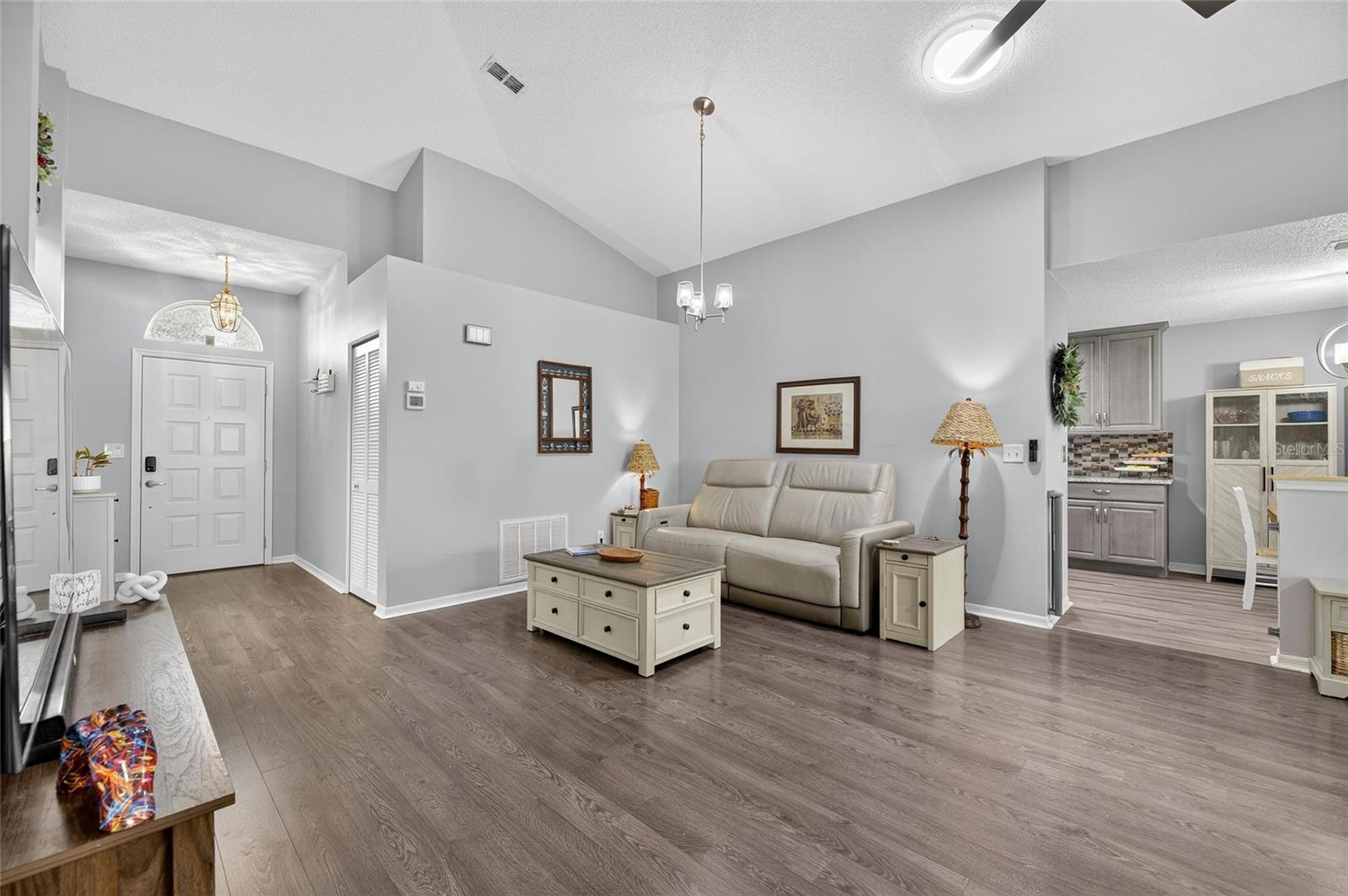 Living room/Dining room combo (currently used as TV and gathering area)