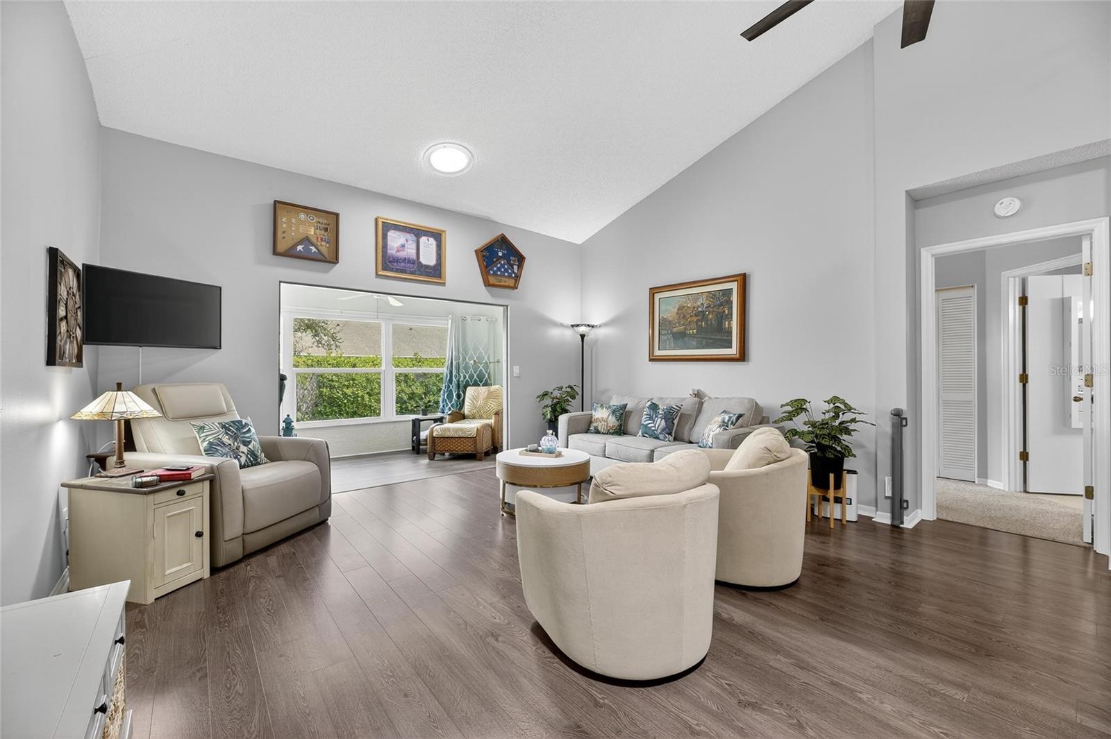 Living room/Dining room combo (currently used as TV and gathering area)