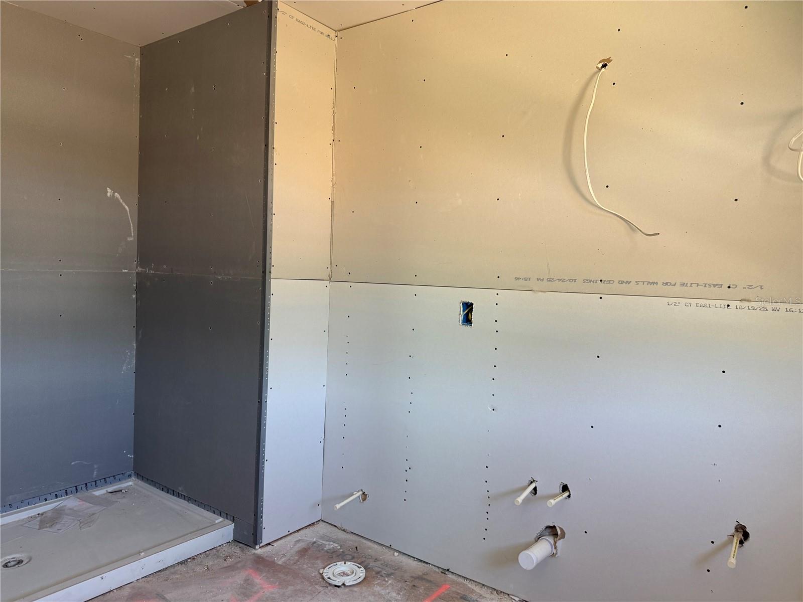 Luxurious Primary Bathroom with elegant frameless glass shower