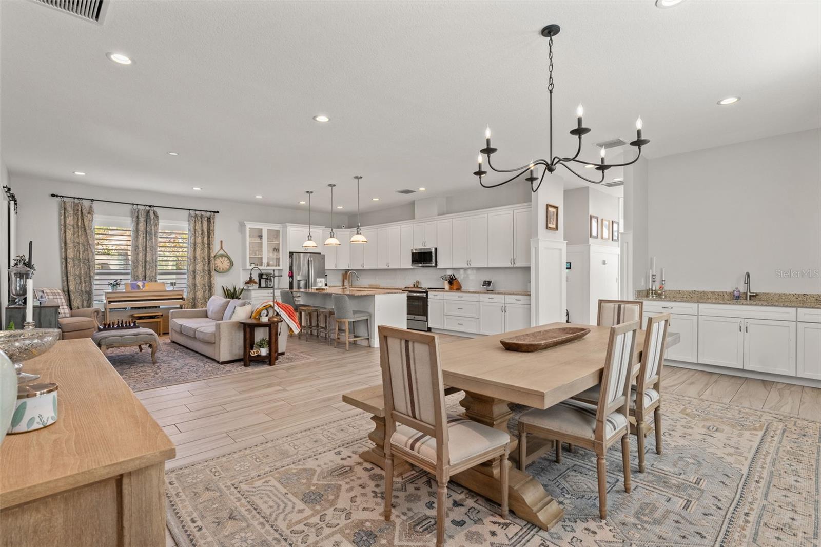 Seamless flow from the dining area to the living room and kitchen, perfect for entertaining.
