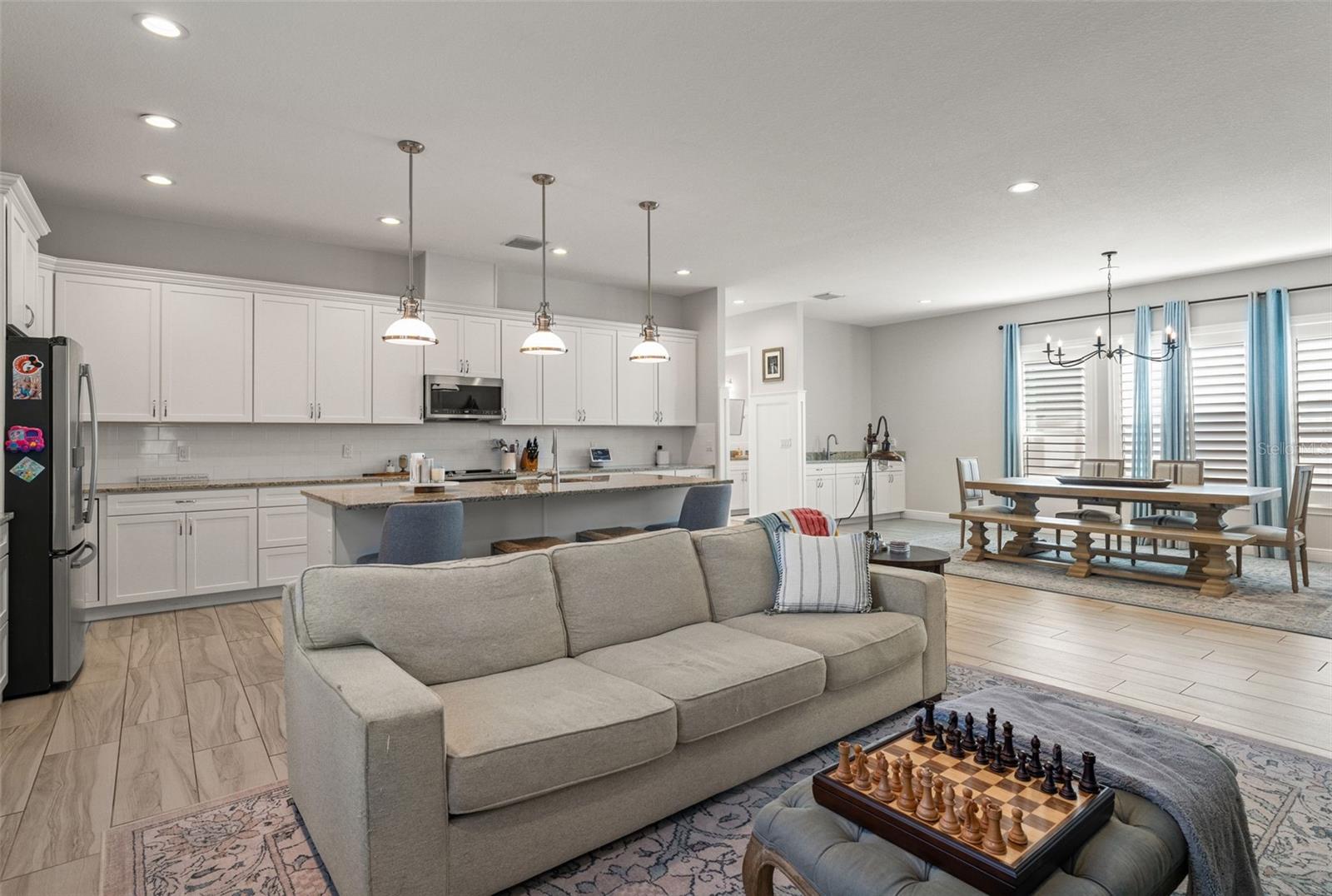 Light-filled great room showcasing the home’s open-concept design and modern finishes.