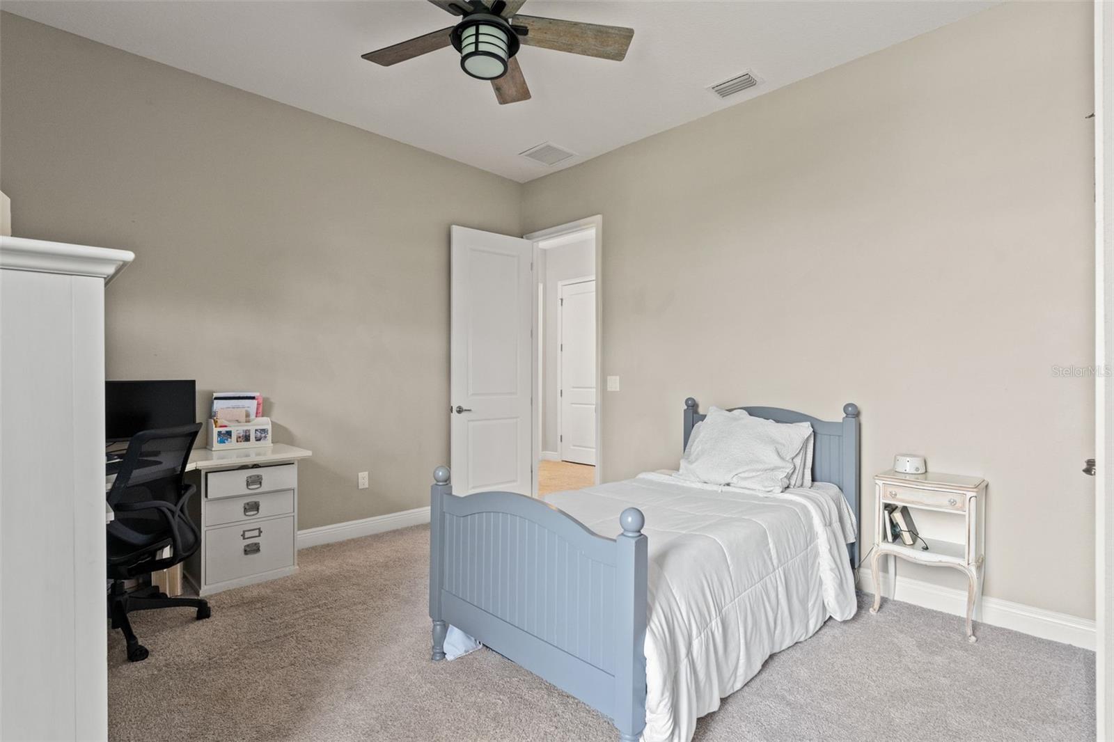 Additional perspective showing generous closet space and room for furnishings.