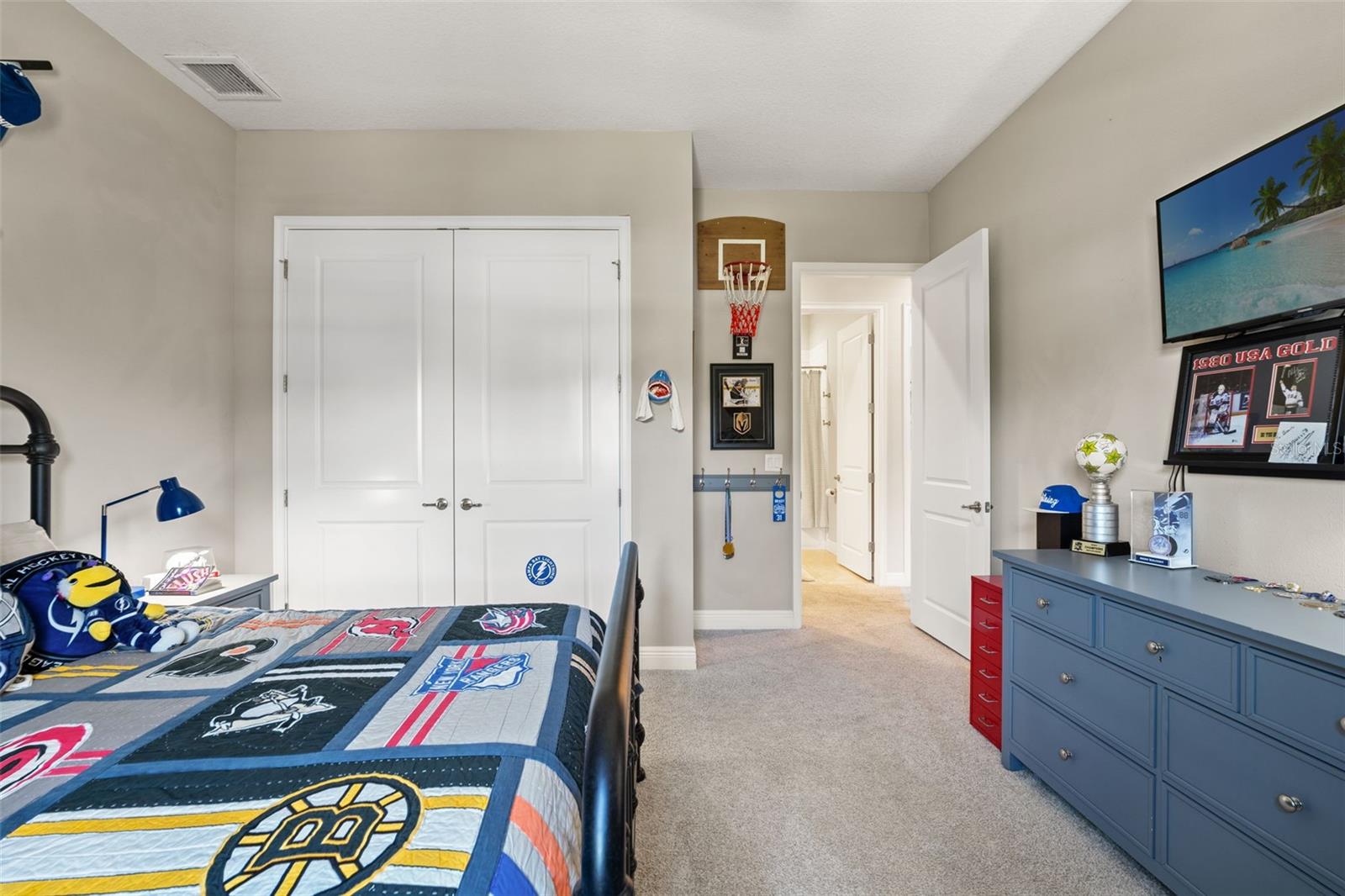 Additional angle highlighting closet storage and natural light.