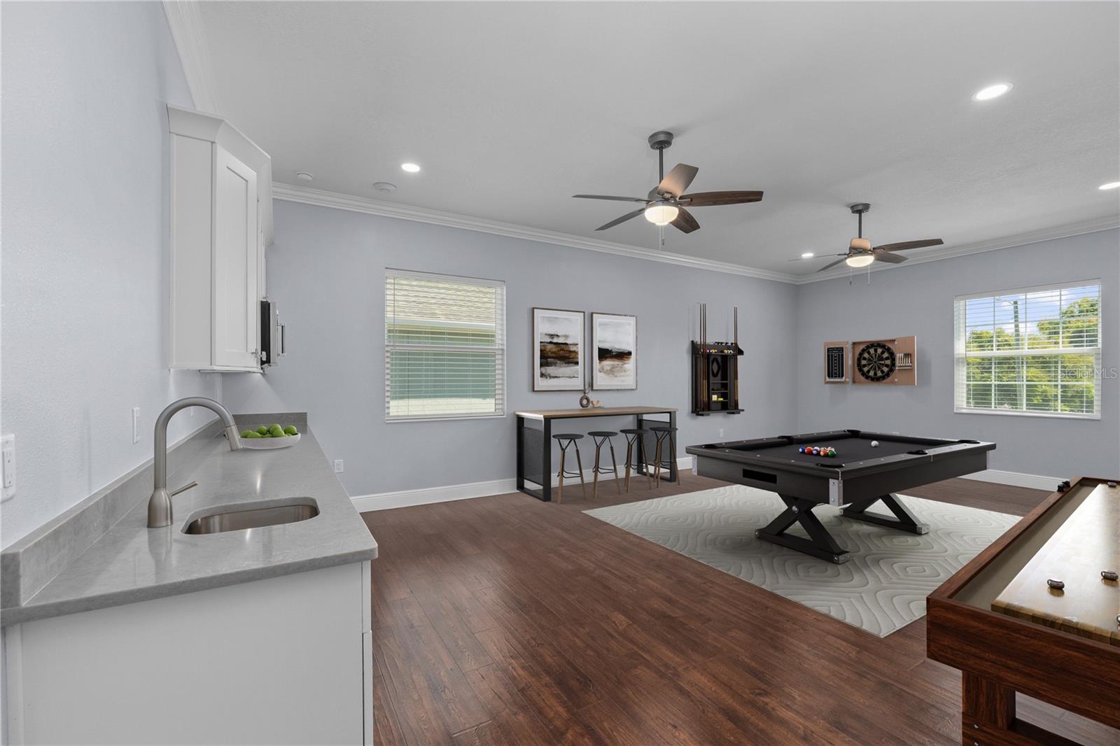 The Bonus Room has endless opportunities with its sink, microwave and fridge