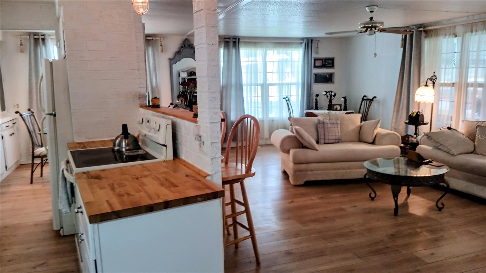 Open concept kitchen/dining/living