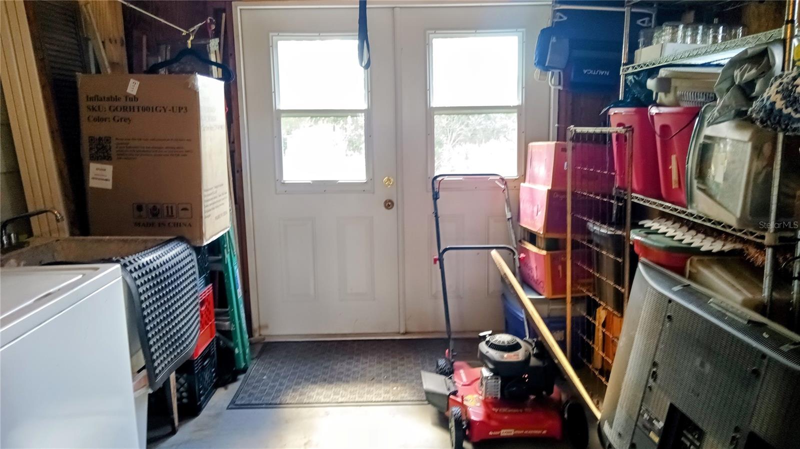 Double doors on Golf Cart Shed/Laundry room