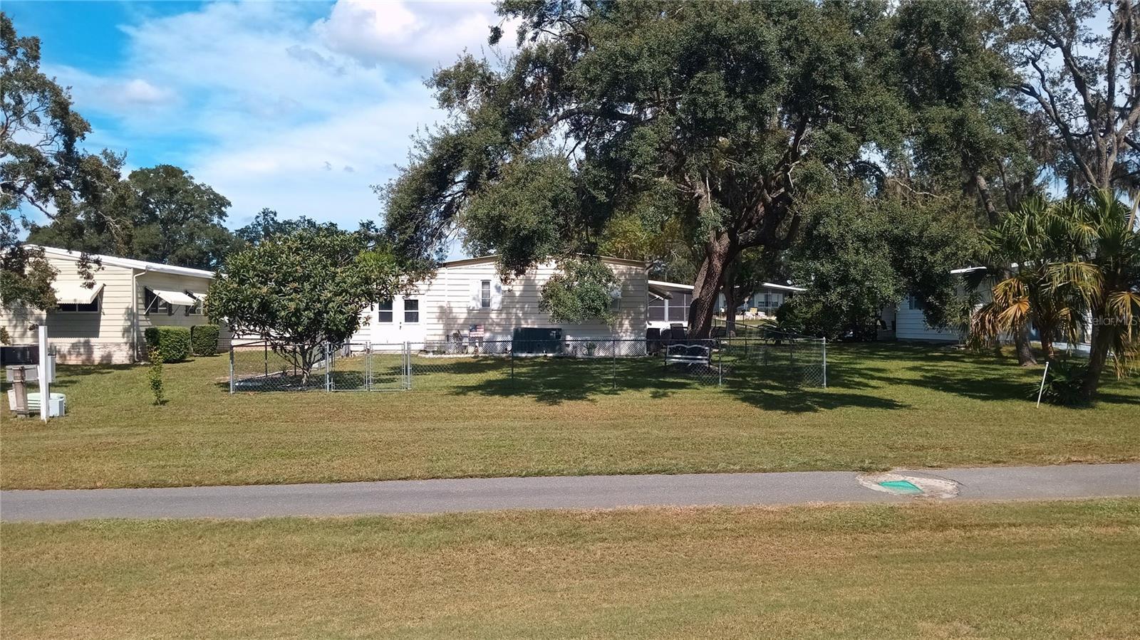 Golf cart easily accessible from your fenced in back yard.