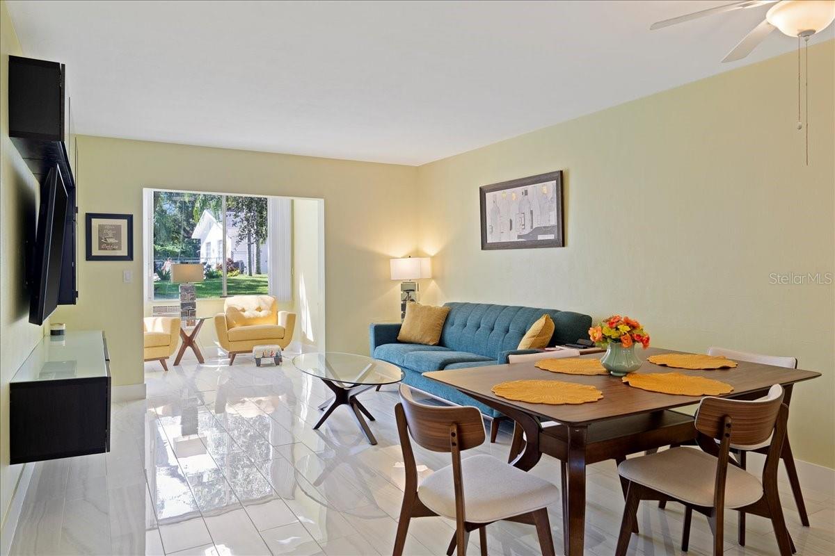 Dining area off kitchen flows into the living room