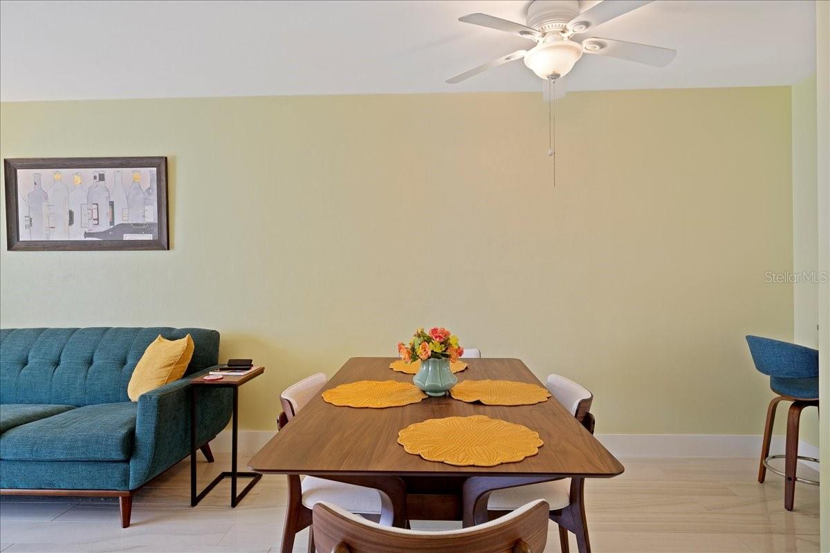 Dining area off kitchen flows into the living room