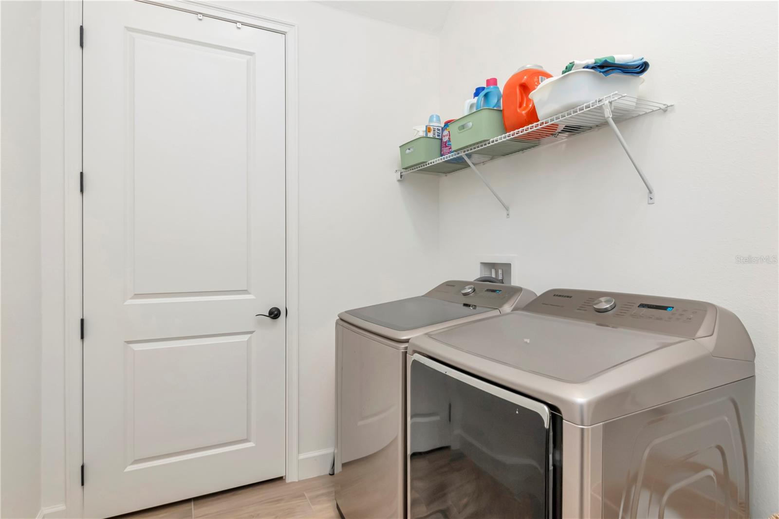 Huge Laundry Room with large storage closet