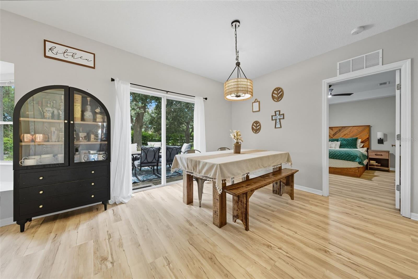 Bright dining area overlooking the backyard