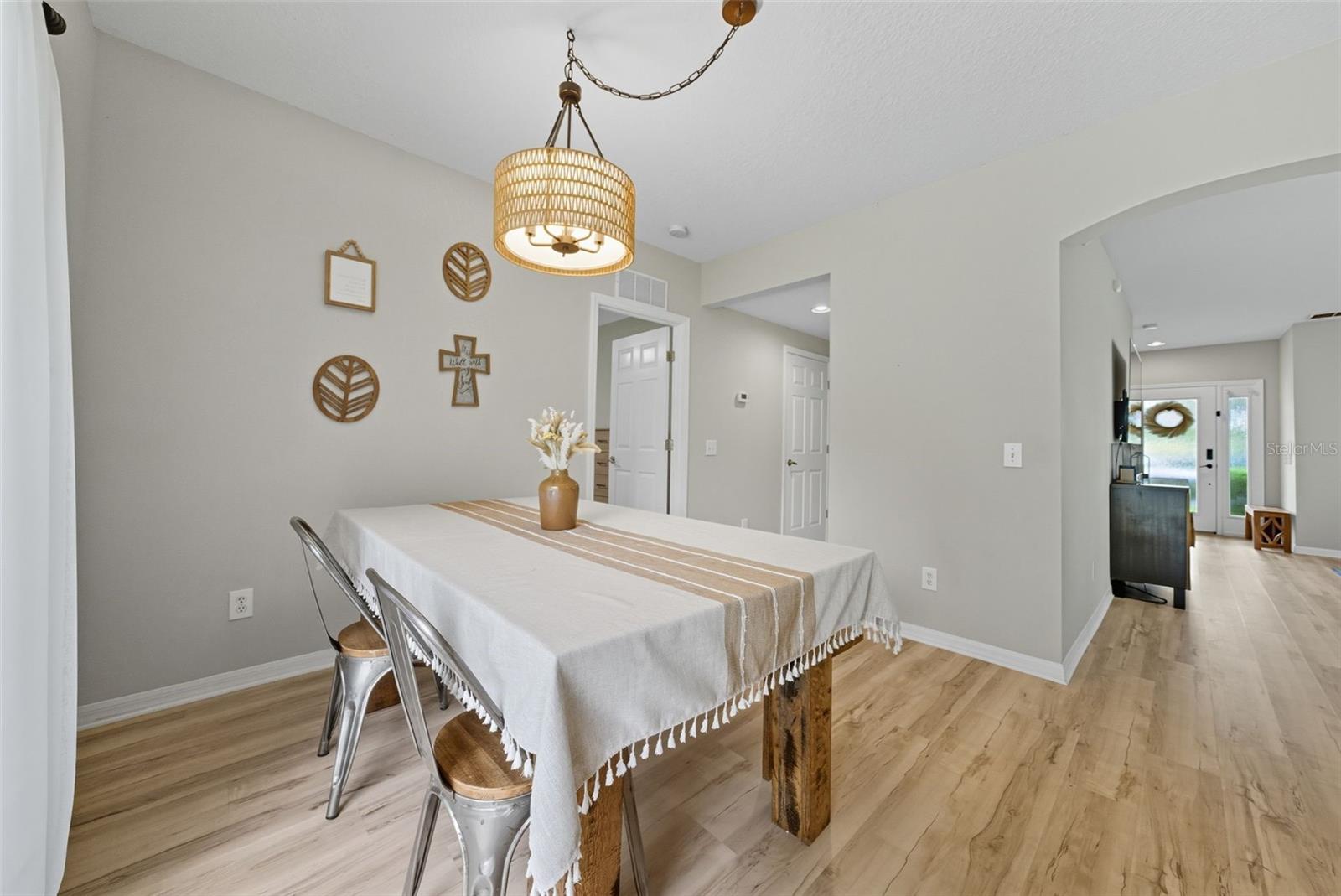 Dining room with an updated light fixture