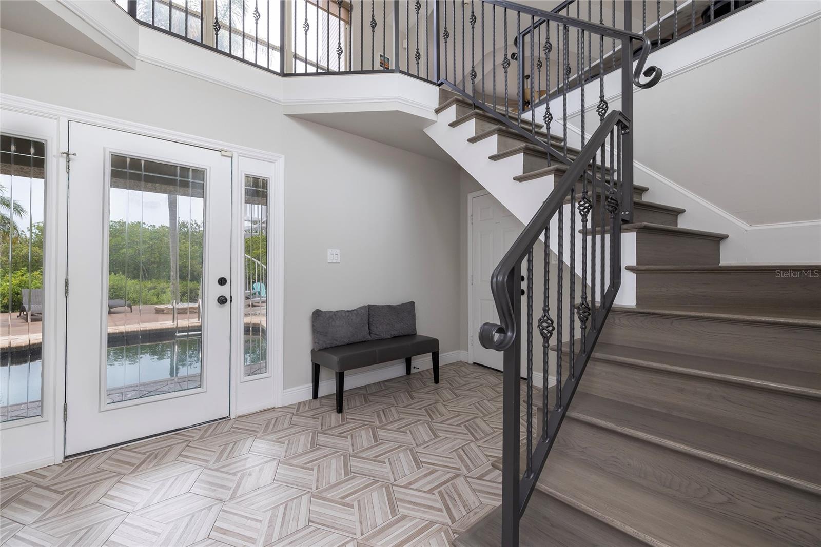 Notice the pool views as soon as you enter the home!
