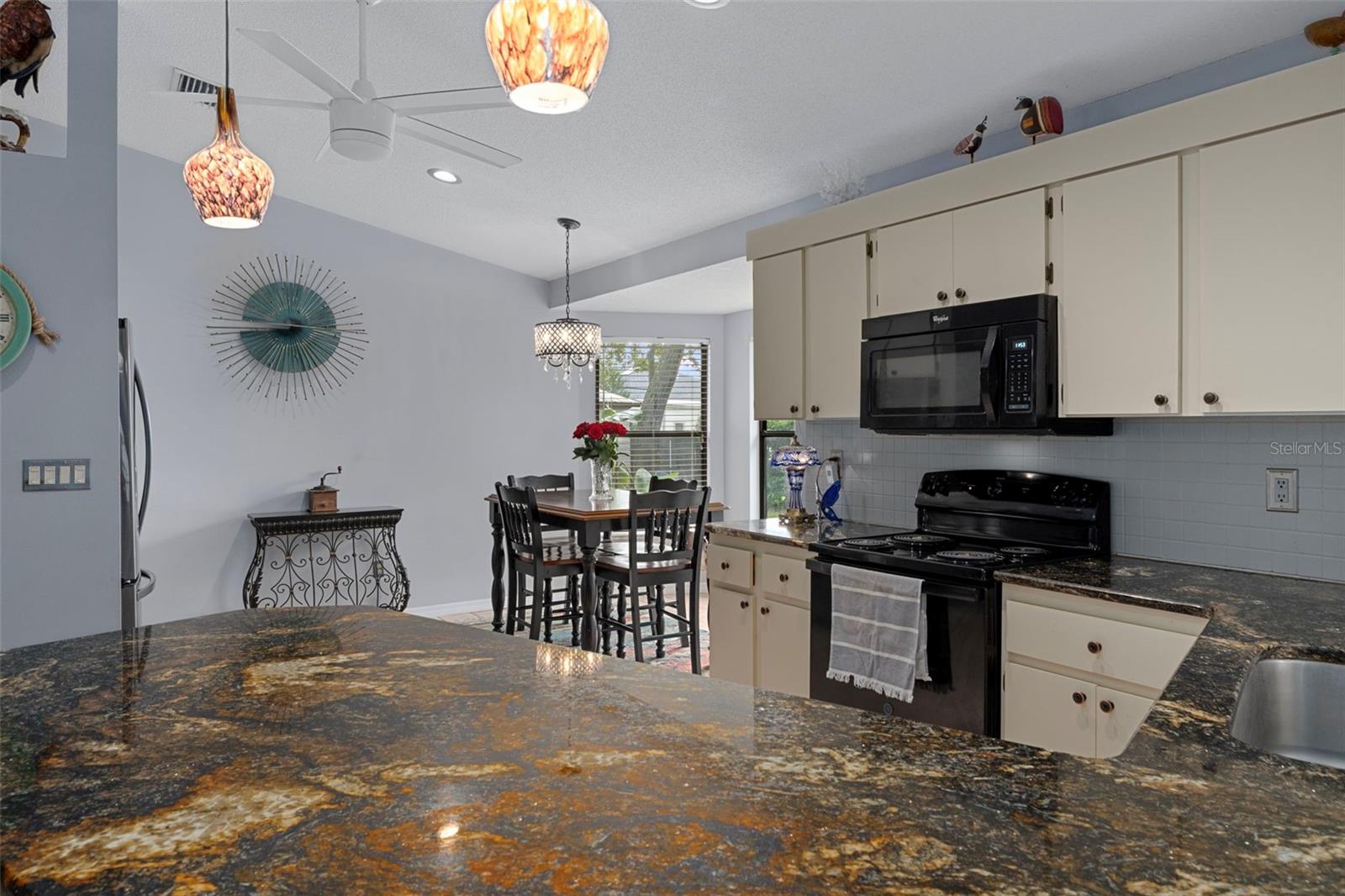 The Kitchen has beautiful Granite Counter Tops beautiful accent lighting