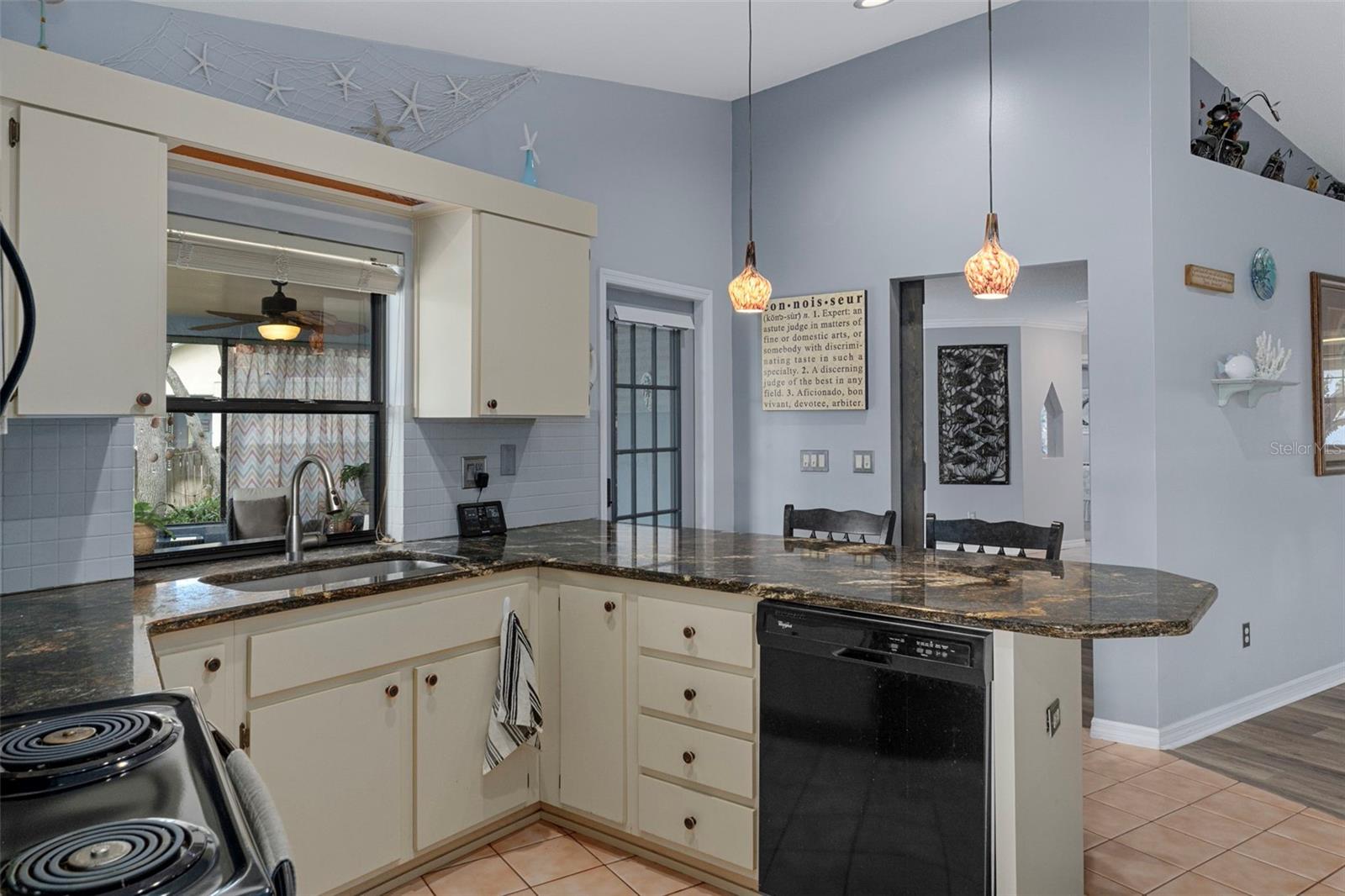 Notice the Breakfast Bar, perfect for casual meals
