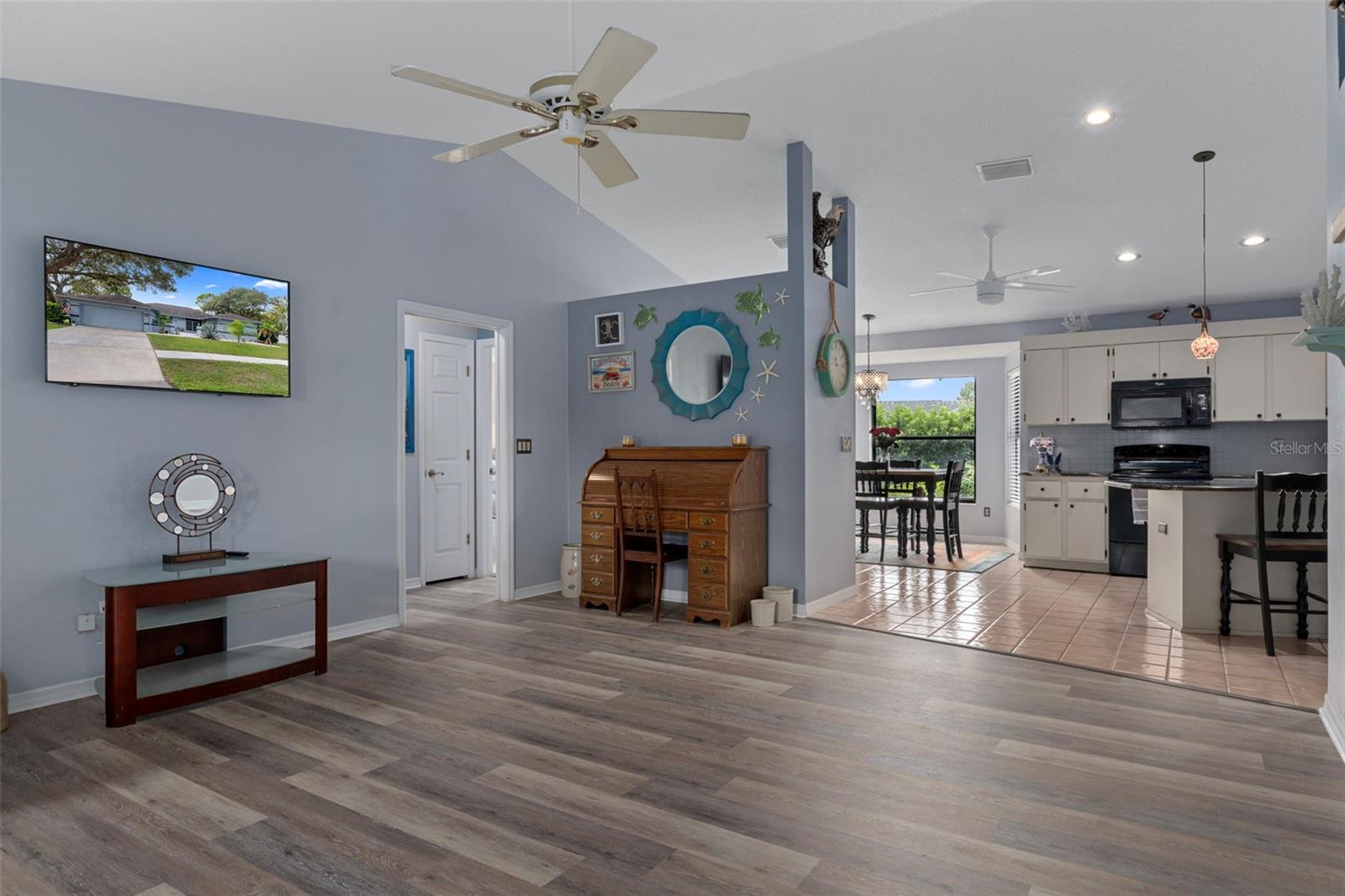 Notice the brand new waterproof vinyl plank flooring