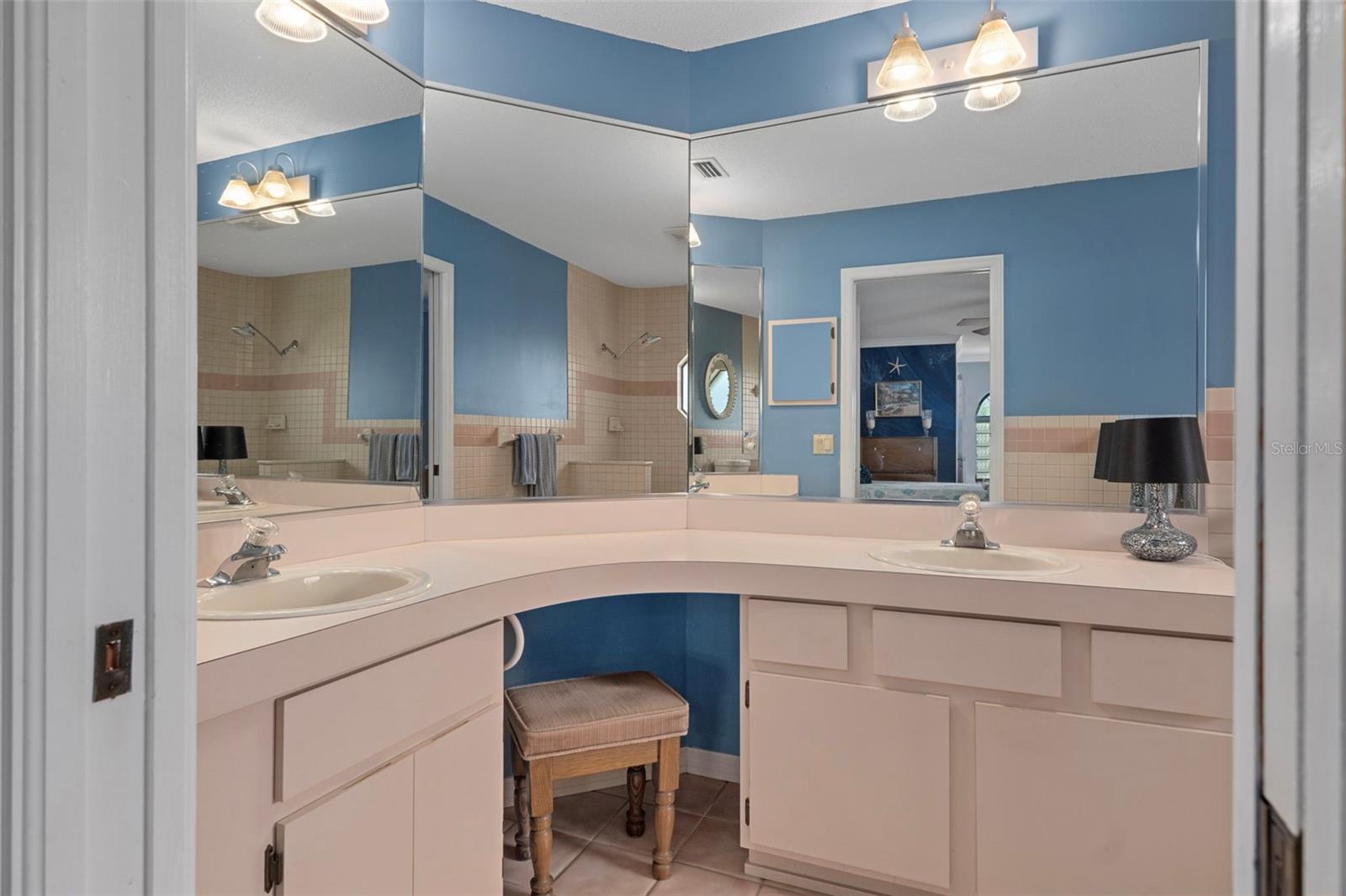 Notice the Dual Sinks and Spacious Vanity with lots of drawers and cabinet space