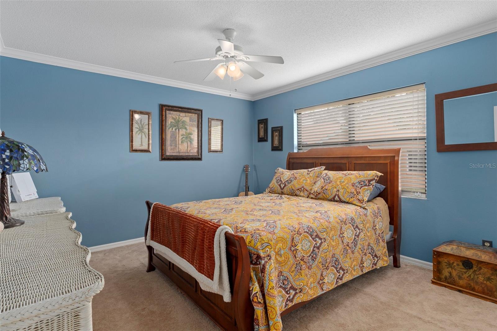 The Guest Bedroom has lovely crown molding