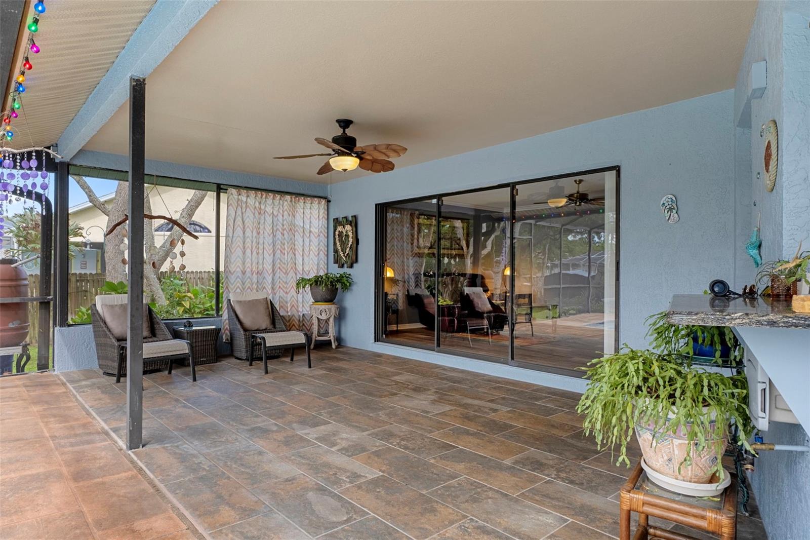 Notice the Lovely outdoor tile in the huge Lanai and around the pool.