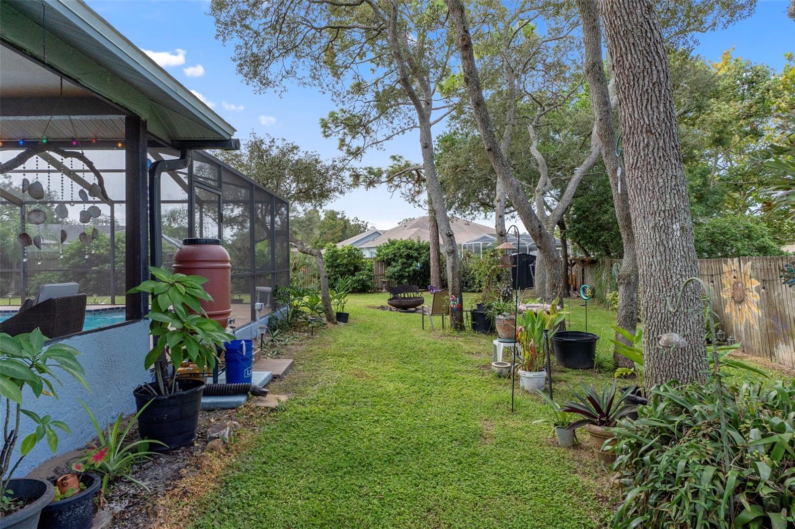 Yard to the right of the pool