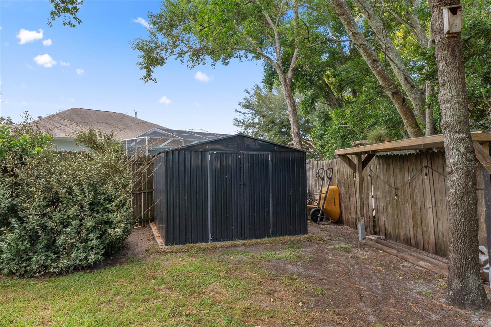 There is a brand new Brand New metal building in the back yard