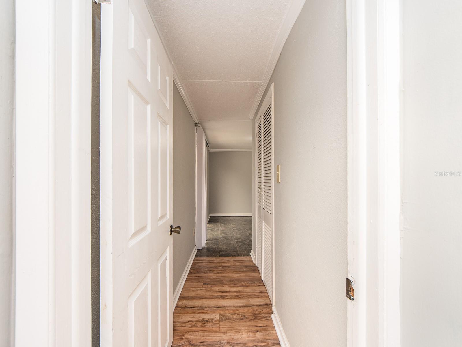 Hall to rear bedroom