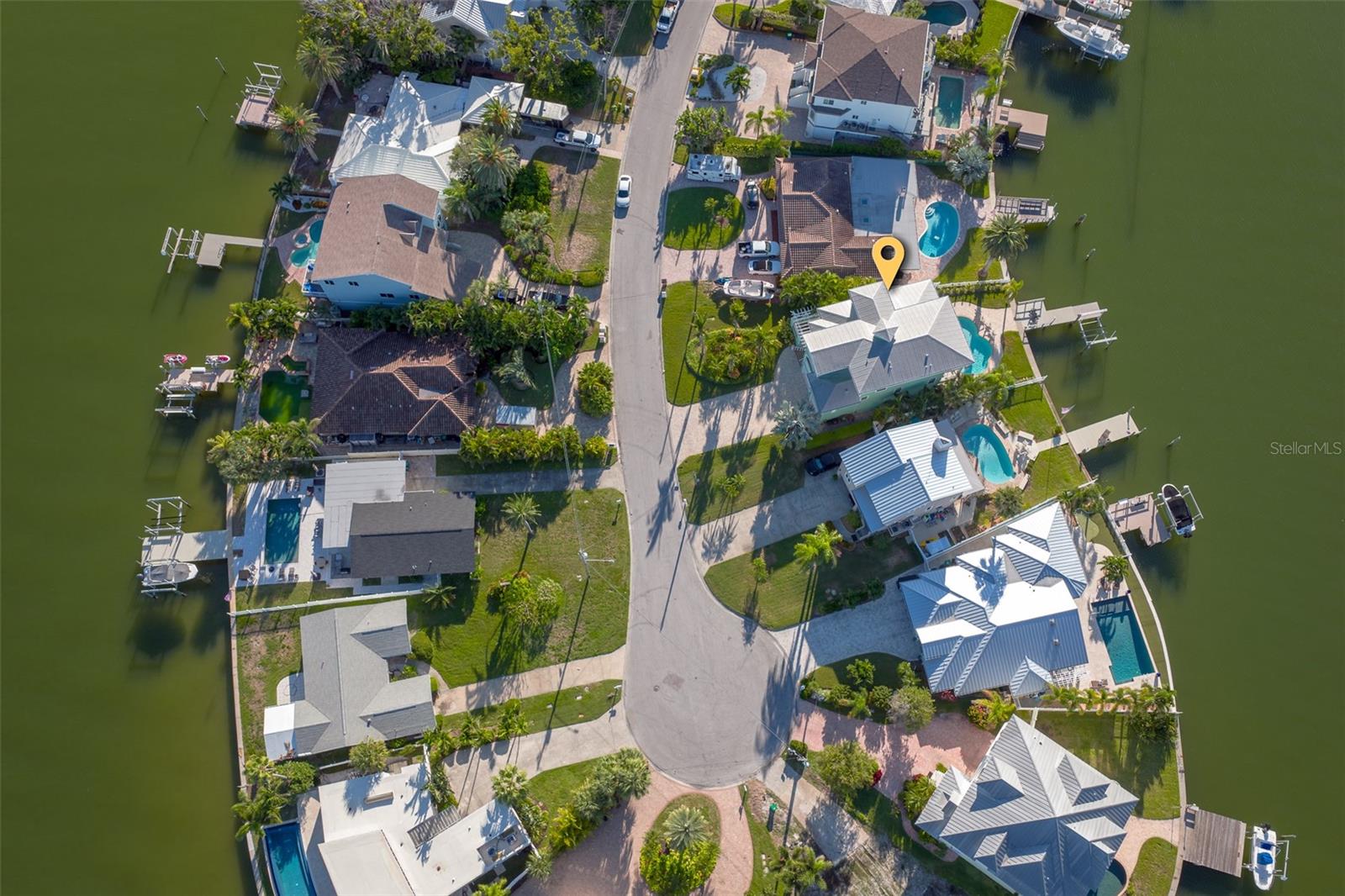 Perfectly positioned at the end of a cul-de-sac to capture endless views, this is a premier point lot location in very desirable Indian Rocks Beach!