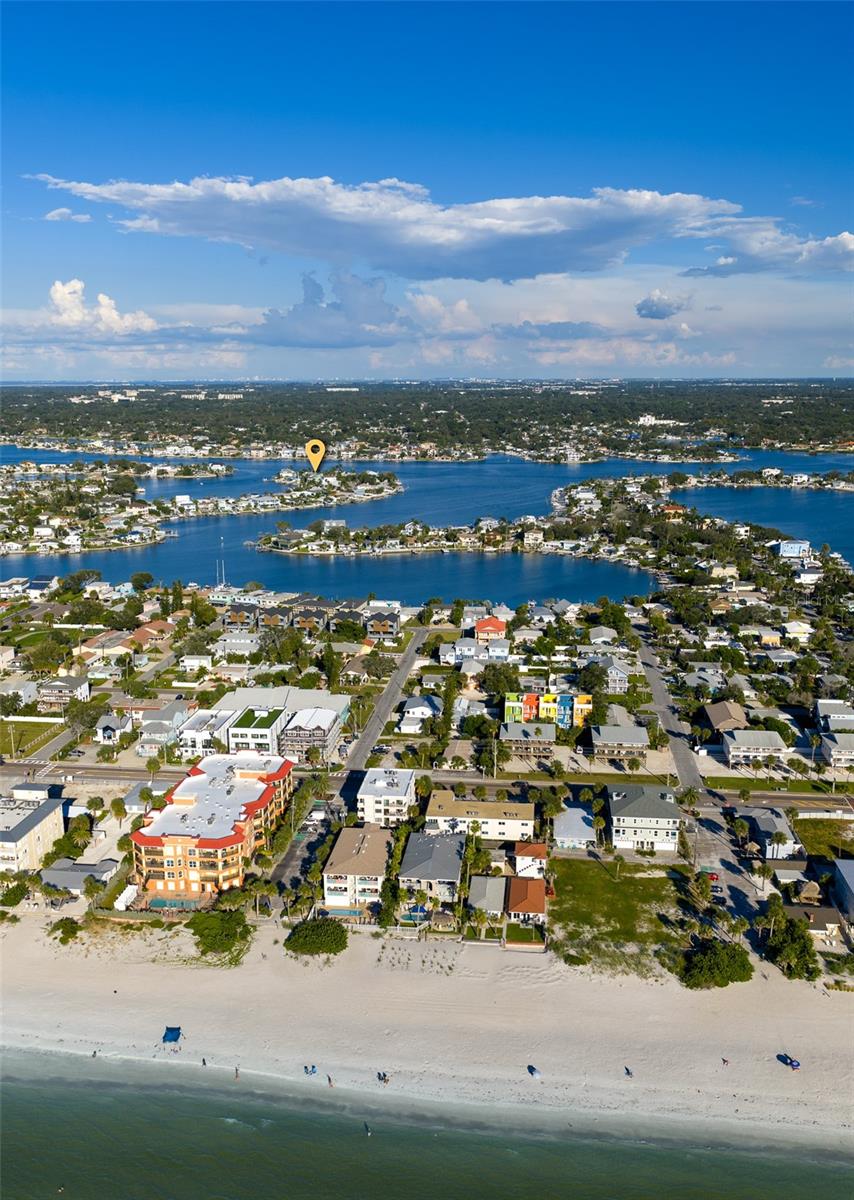 Just a short golf cart ride to miles of sugar white sandy beaches where one can enjoy a multitude of fun or relaxation by the shore.