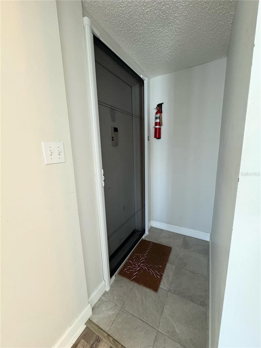 Entry way with rolling screen door