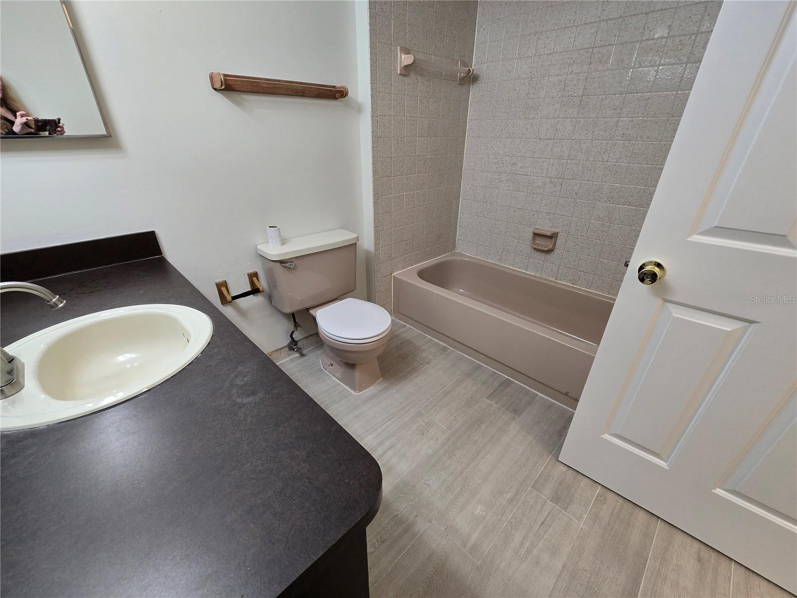 2nd Bath, can be accessed through the hallway and/or the 2nd bedroom