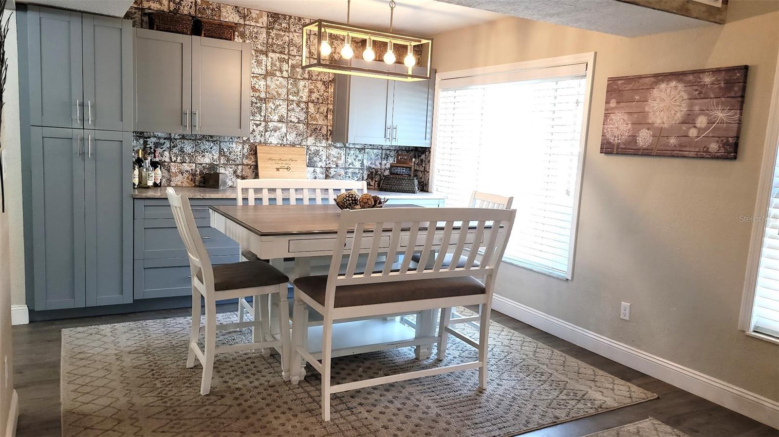 This area off of the kitchen is perfect for entertaining and game nights!