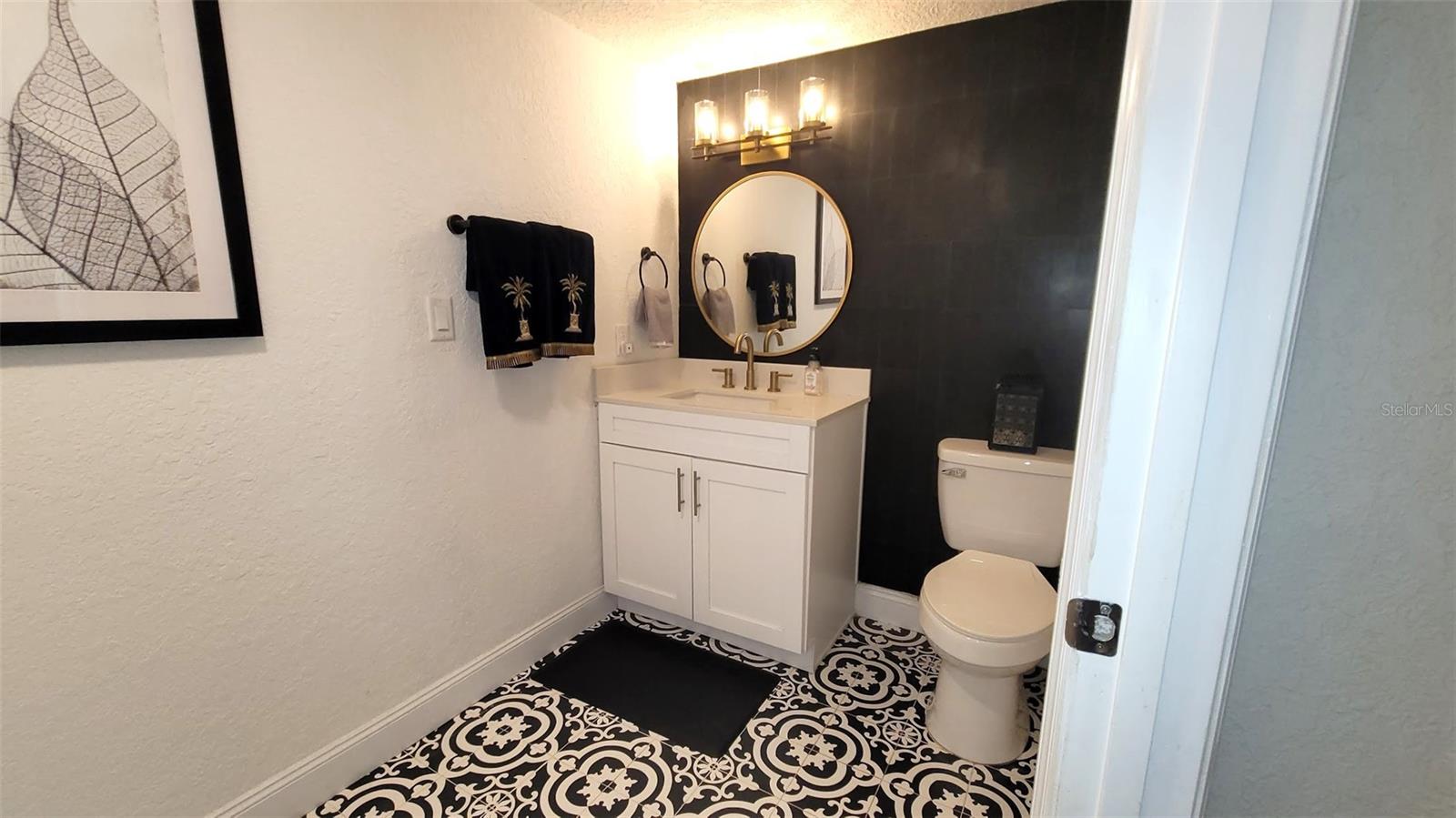 There is a very large 1/2 bath on the first floor for your guests to use.