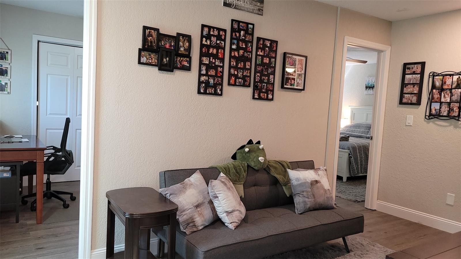 This space just outside 2 of the bedrooms is where the grandkids relax in the morning watching tv.