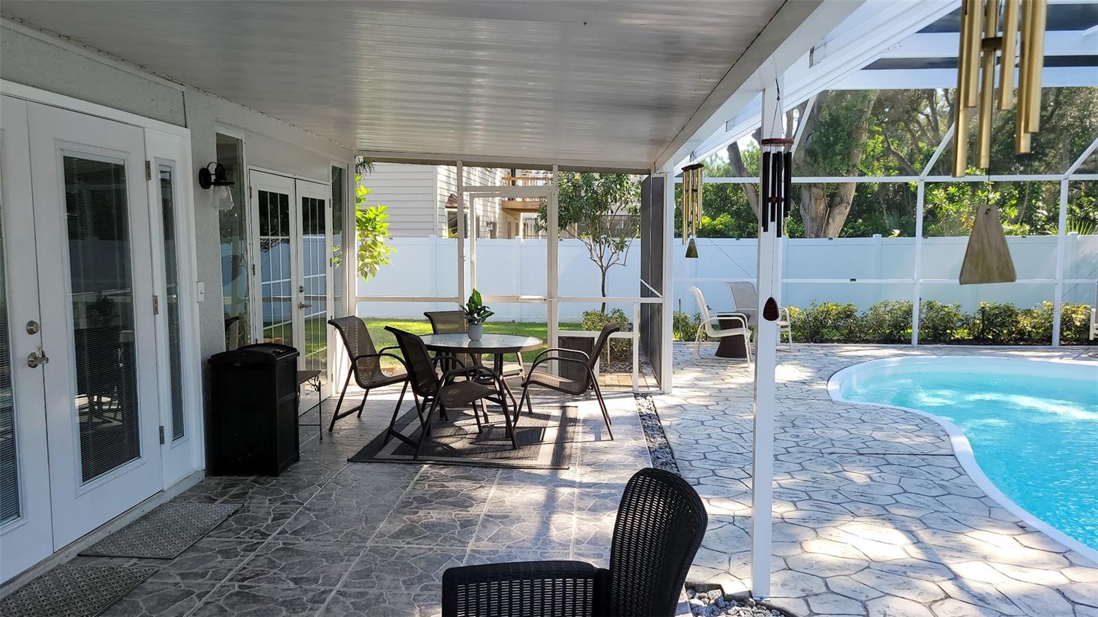 Another area within the screened patio to relax.