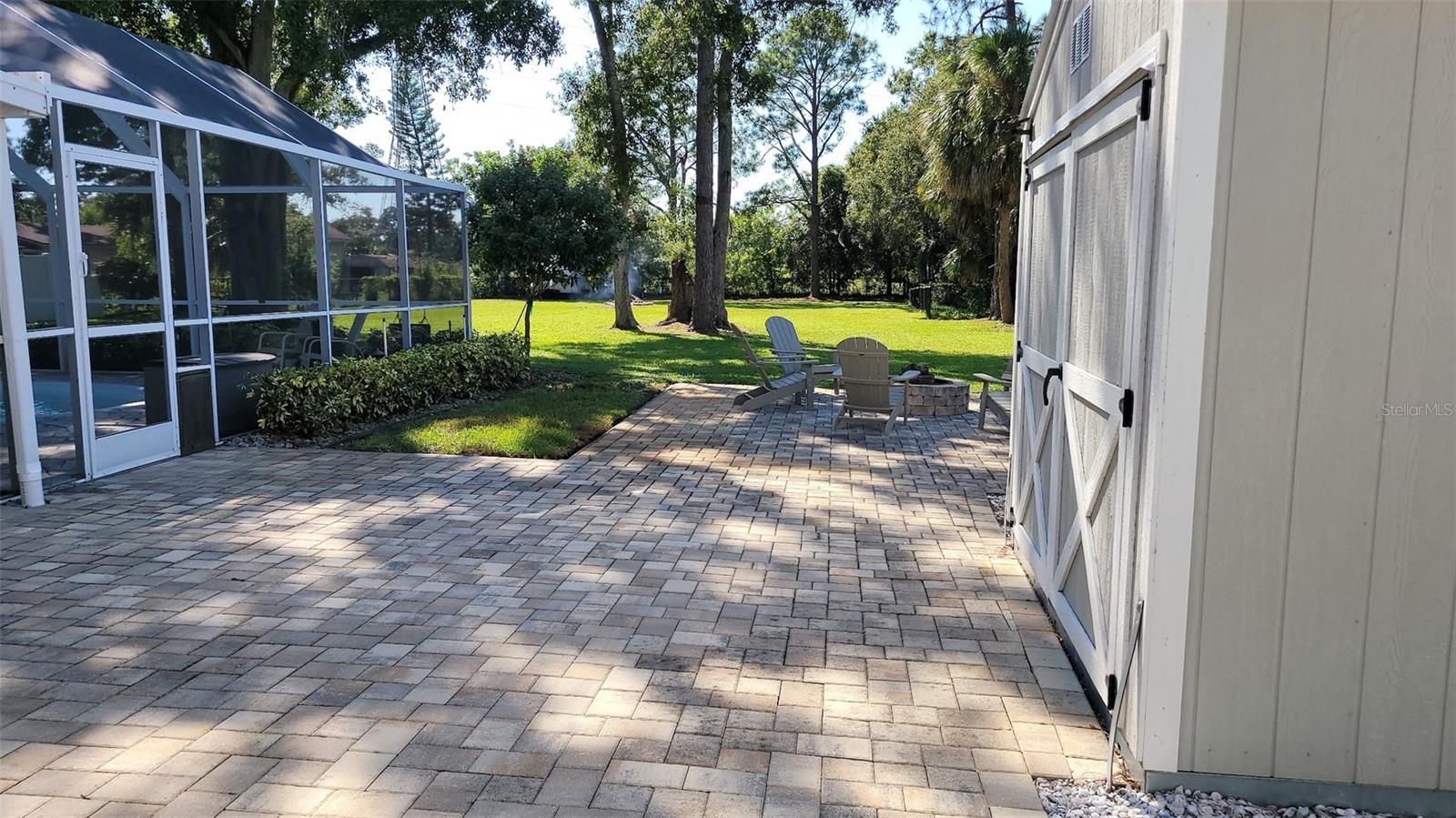 Pavered Patio leading to the Tuff Shed and the firepit area. So much room to enjoy the great outdoors!