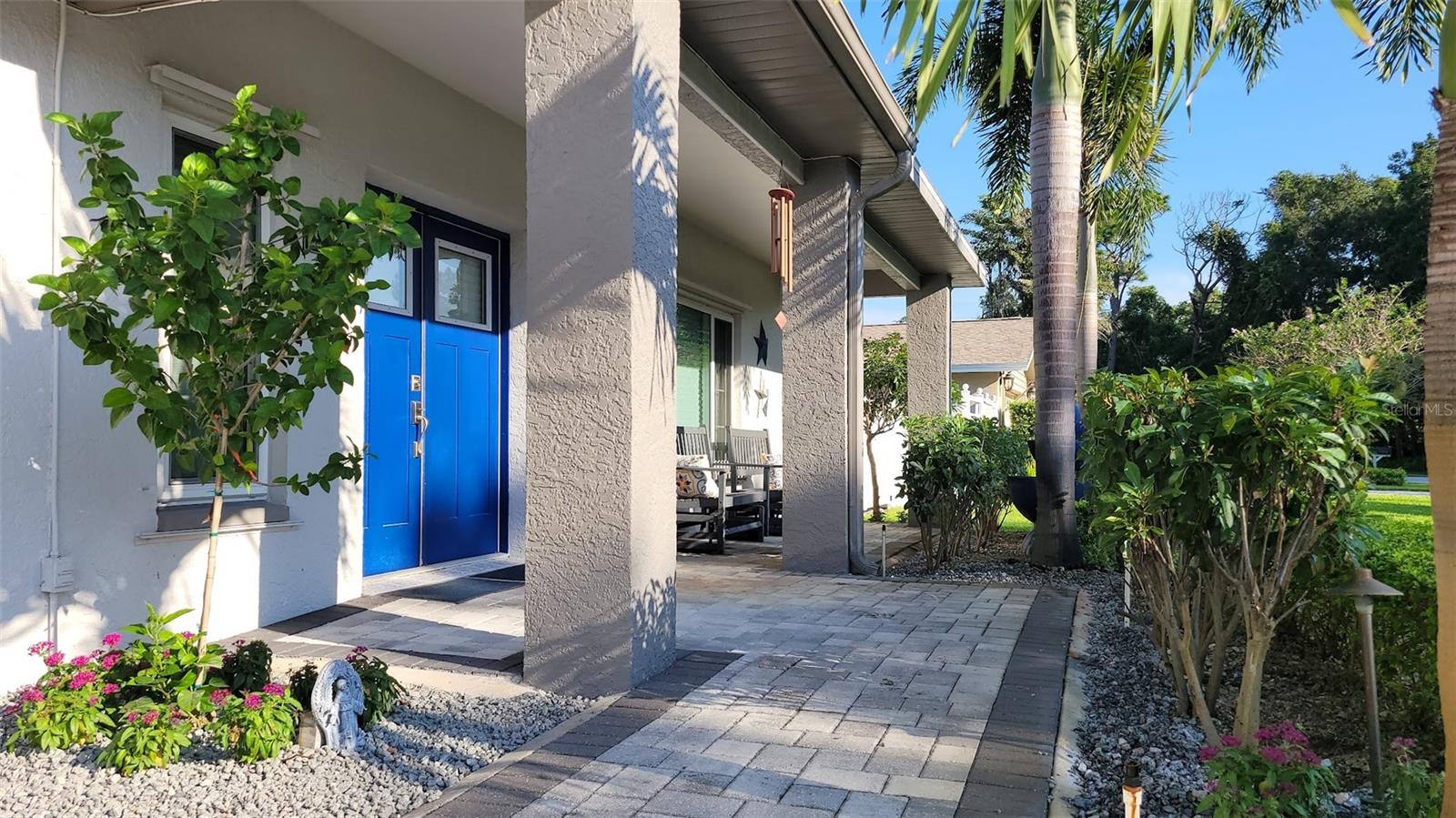 The front patio has space to relax and read a book or visit with friends.