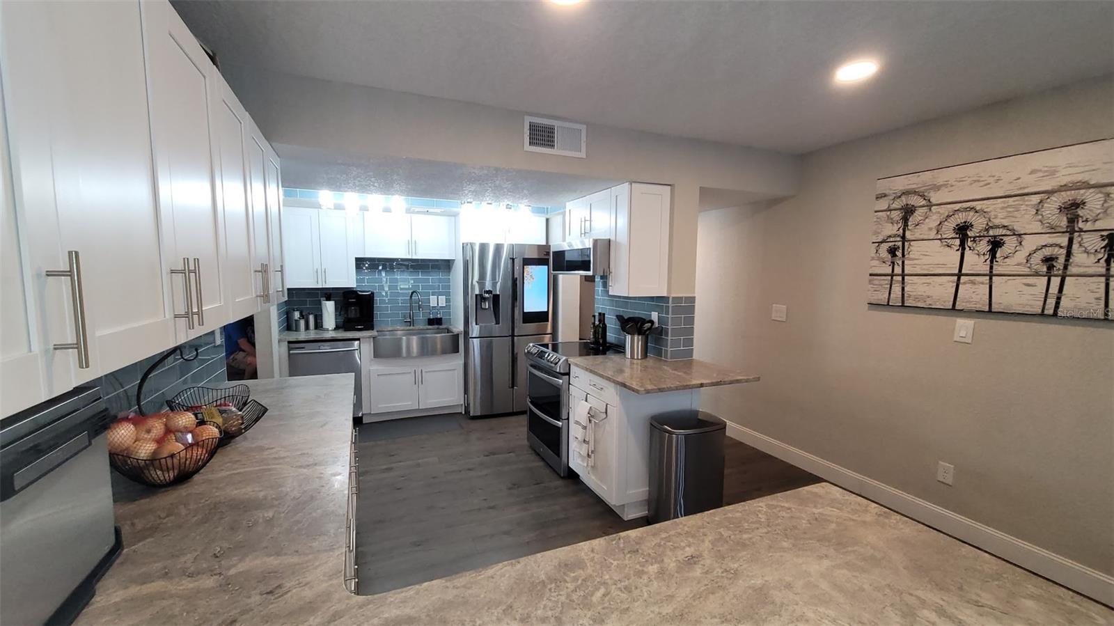 Imagine cooking in this kitchen with all the countertops and space to utilize.
