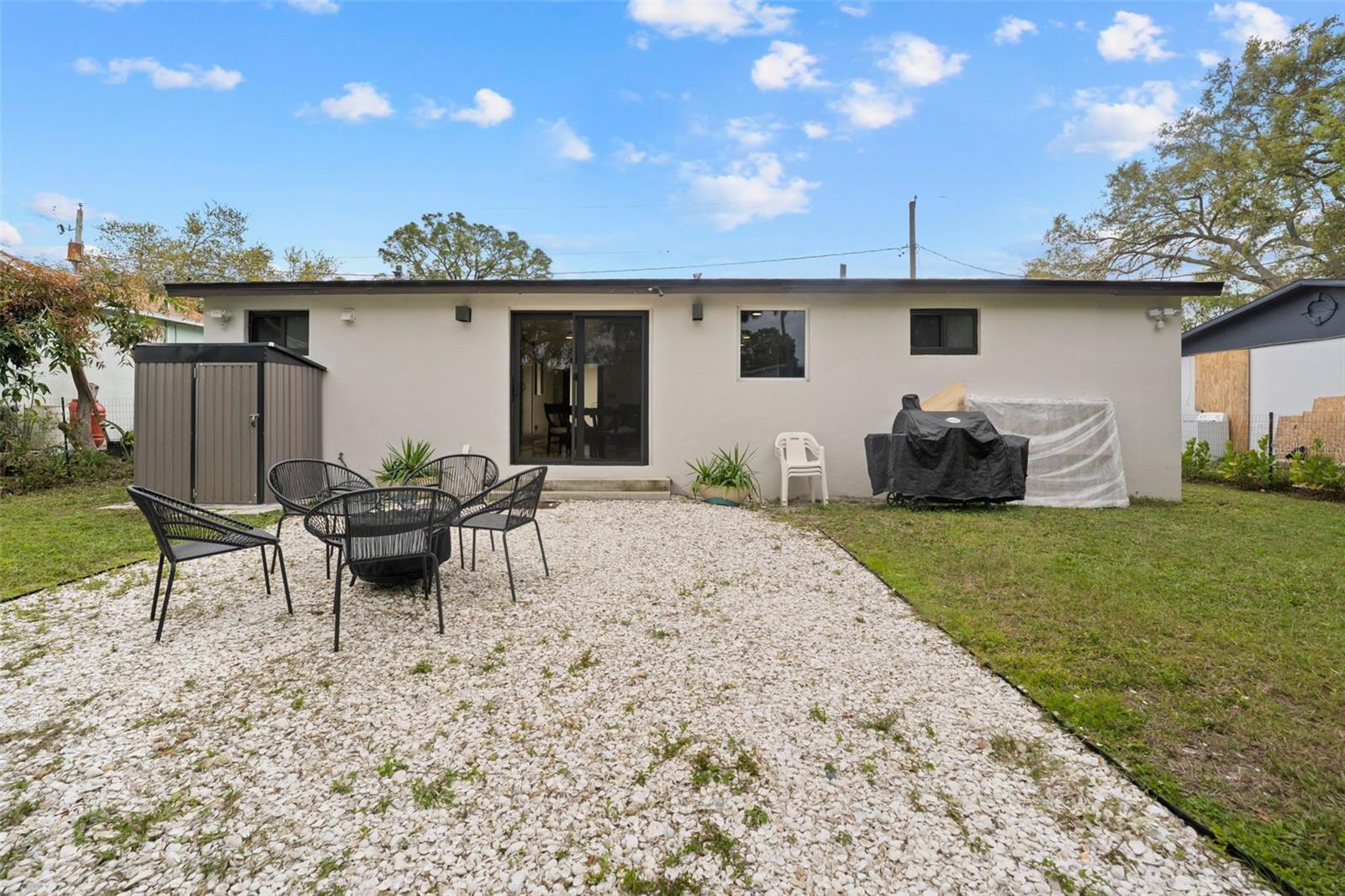 Back of home with shed