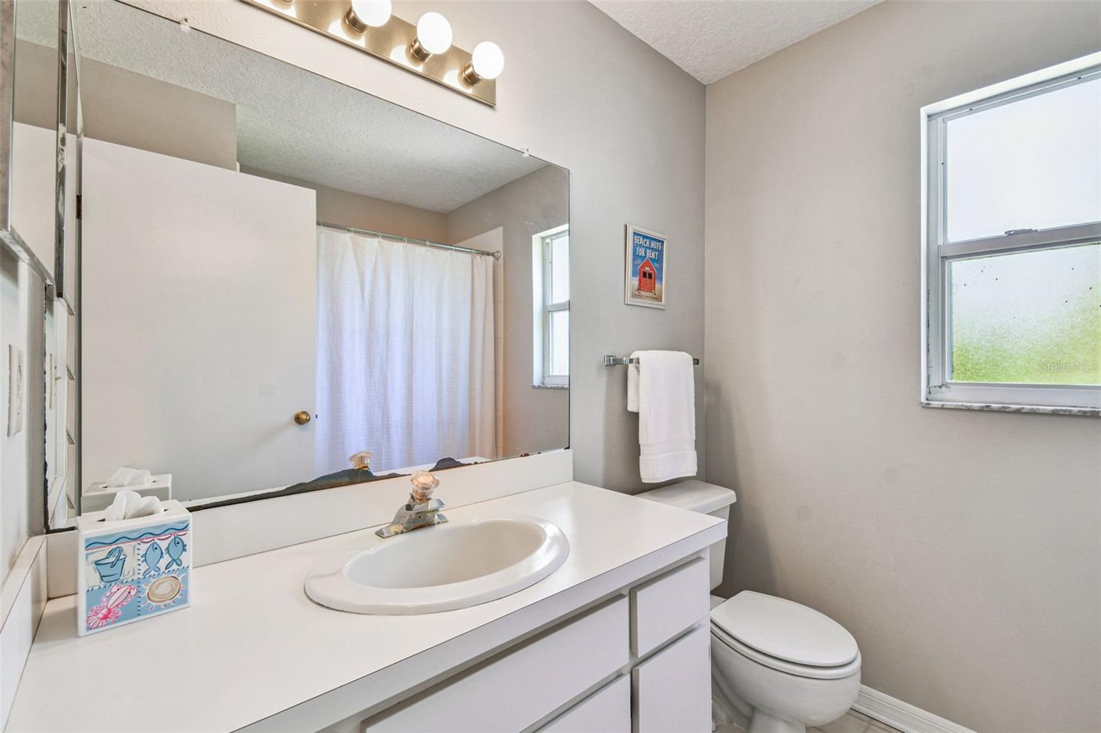 Hall Bathroom serves as the 2nd bedroom and is also the pool bathroom