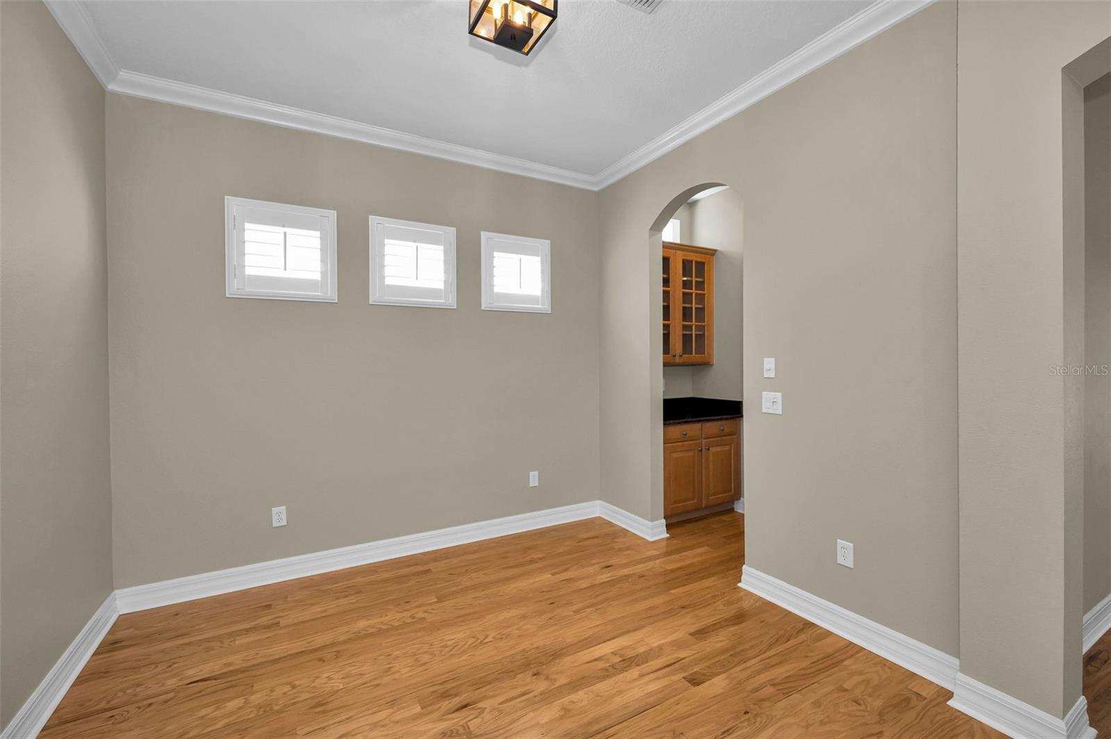 Dining room with natural light and plantation shutters