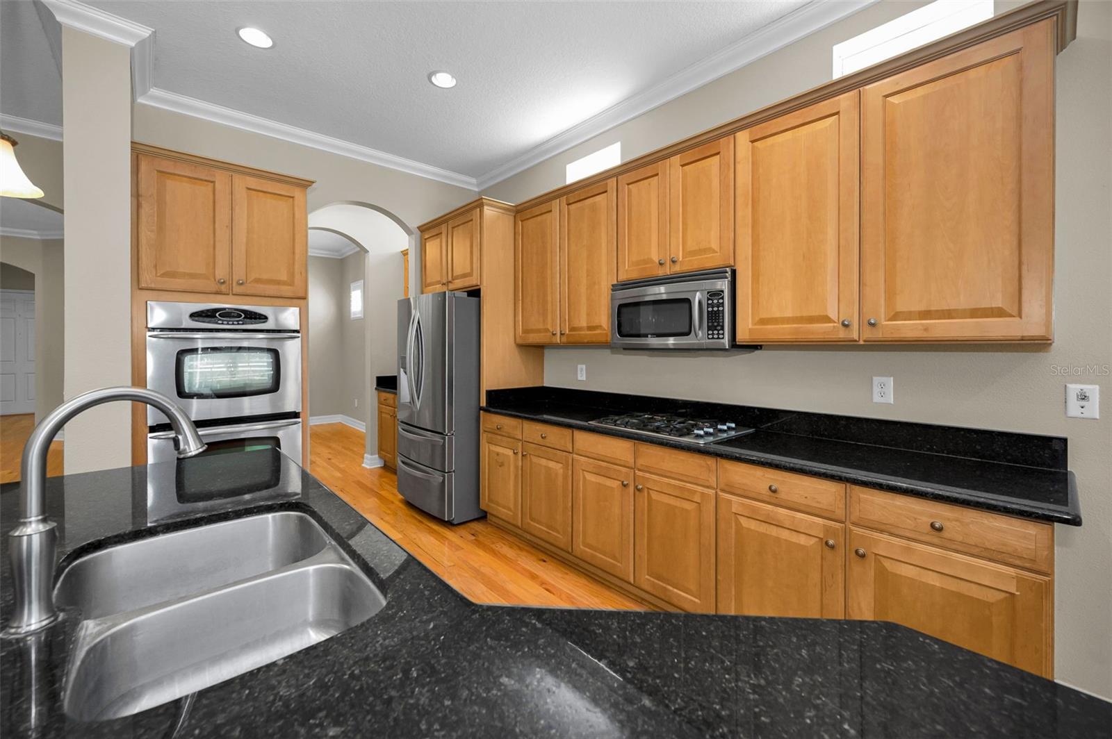Double wall ovens and 42" wood cabinets