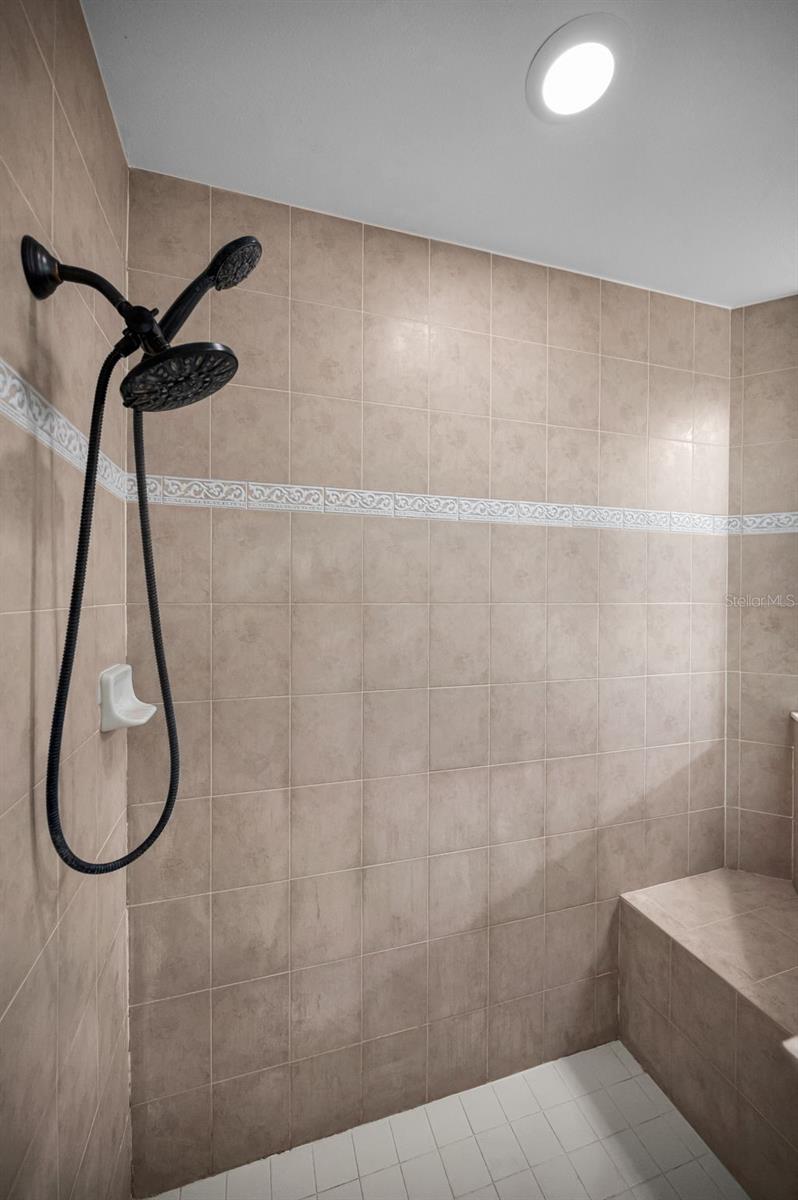 Primary shower with bench seat