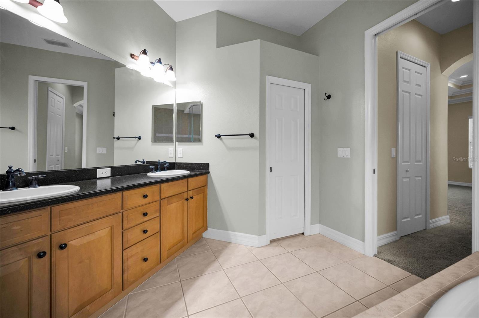 dual sinks and privacy water closet